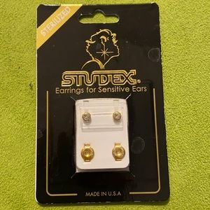 Gold plated diamond stud.